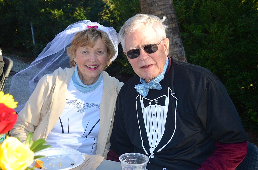 Sharon and Pete Meyer enjoy snacks with friends.