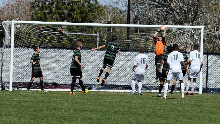 Lakewood Ranch goalie Liam Bramley notches one of his 12 saves on the afternoon.