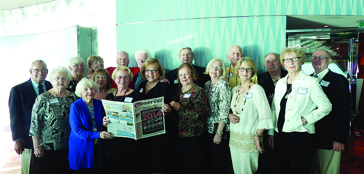 SEAS THE MOMENT. Residents of Spanish Main Yacht Club enjoyed reading the Longboat Observer during a January cruise to Grand Cayman Island and Cozumel, Mexico, on Royal Caribbean's Brilliance of the Seas.