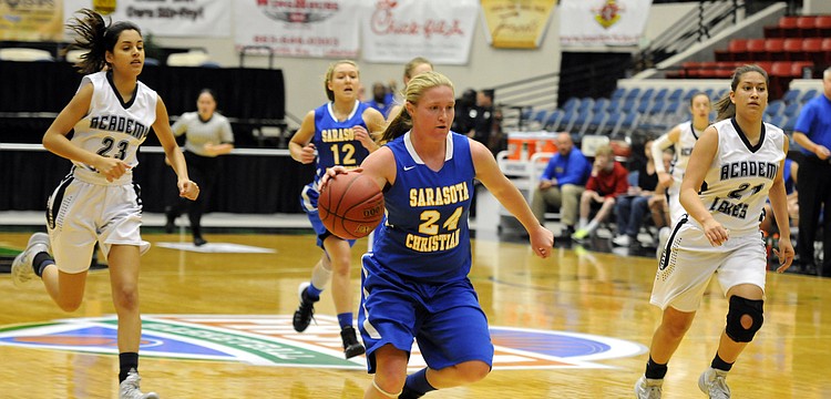 Sarasota Christian guard Megan Garriott races down the court on a fast break opportunity.