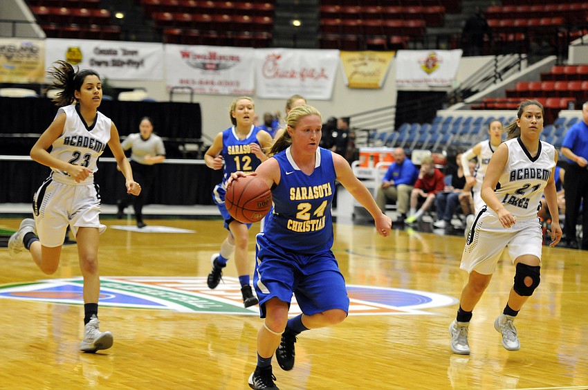 Sarasota Christian guard Megan Garriott races down the court on a fast break opportunity.