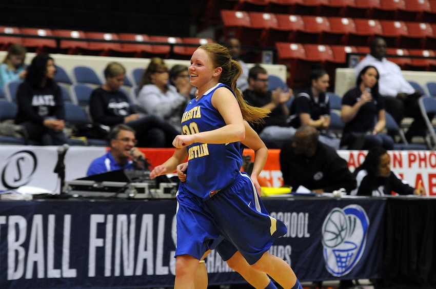 Heidi Miller celebrates following Sarasota Christianâ€™s 68-59 victory over Academy at the Lakes in the FHSAA Class 2A state semifinals Feb. 18.