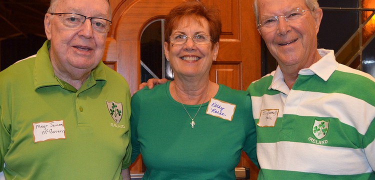 Msgr. James McGovern with Kathy and Jim Roche