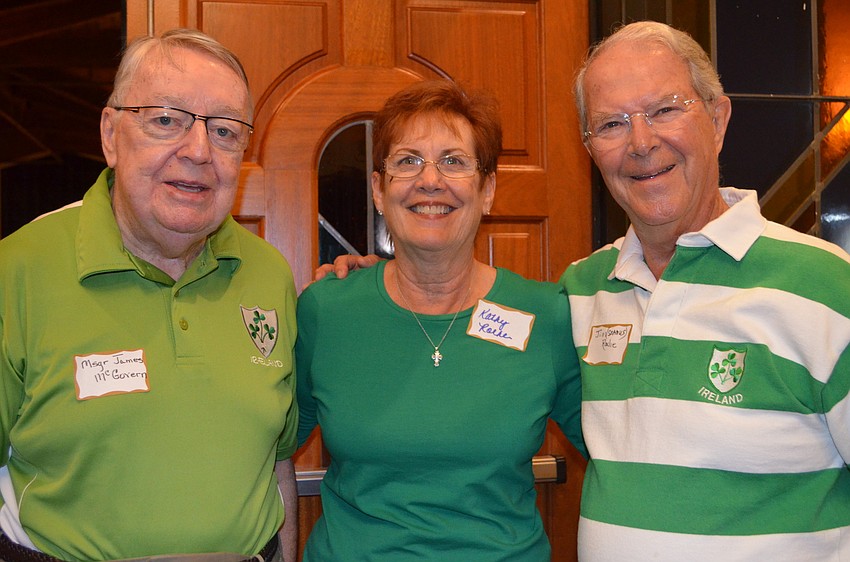 Msgr. James McGovern with Kathy and Jim Roche