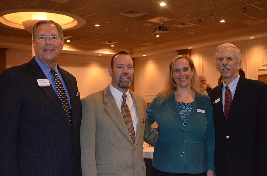 Co-Mentor Bob Melberth with this yearâ€™s Clients of the Year, Chris and Jennifer Mannering of Bounce Down Under, and Co-Mentor Tom Latimer.