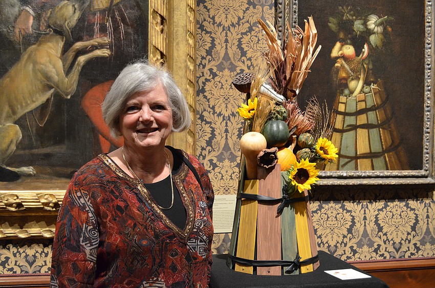 Designer Sue Boyd with her design inspired by 