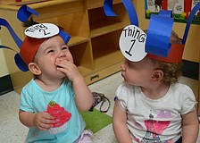 Lily Russ, 1, and Brenlyn Madison, 1, play Thing One and Thing Two.