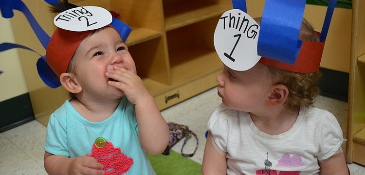 Lily Russ, 1, and Brenlyn Madison, 1, play Thing One and Thing Two.