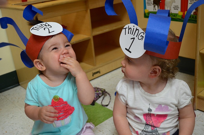 Lily Russ, 1, and Brenlyn Madison, 1, play Thing One and Thing Two.