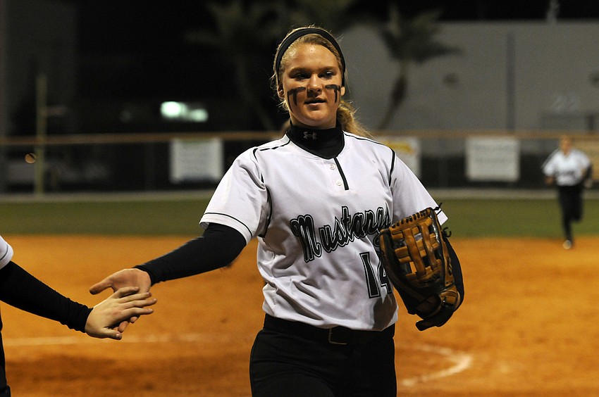 Lakewood Ranch pitcher Amanda Rak is congratulated by her teammates after a scoreless first inning.