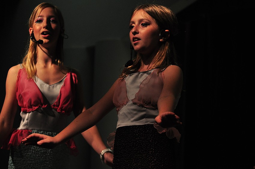 Emily Weott and Kaitlyn Scirica dance to 