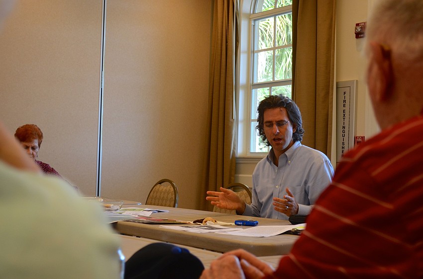 Rabbi Brenner Glickman talks with event attendees about current world events.