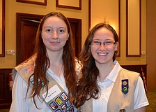 Seventeen-year-olds Megan Reynolds and Emily Sisk sport their Girl Scout vests.