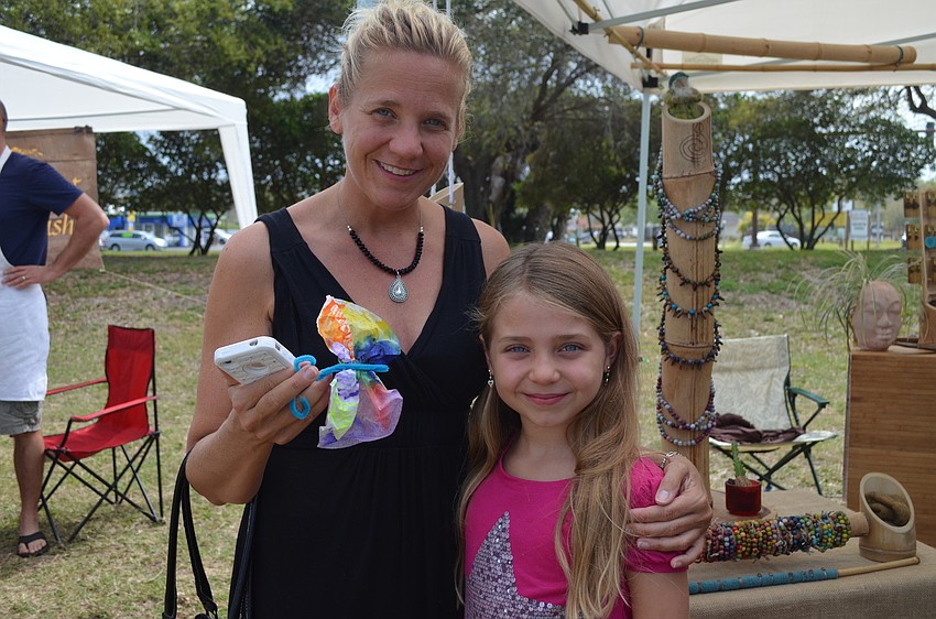 Jeni and Calei Clark made a butterfly out of pipe cleaners and tissue paper.