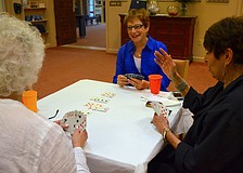 Robin Green laughs during a fun game of bridge.