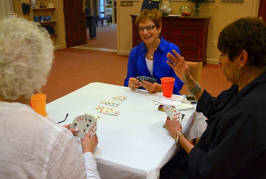 Robin Green laughs during a fun game of bridge.