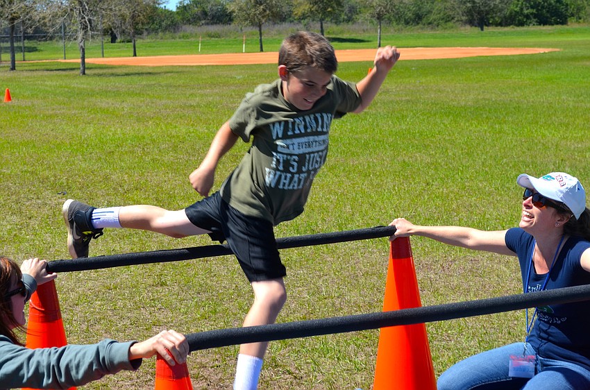 Tobias Davis, 10, races to finish the course.