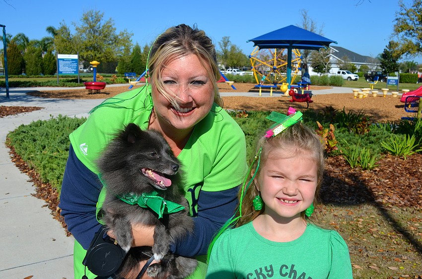 Christy and Britney Peterson with their dog, Coco.