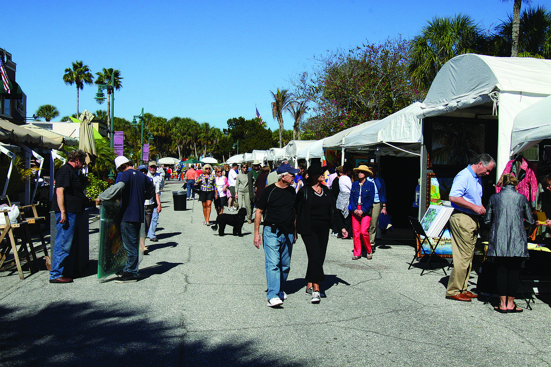 File photo Residents, landowners and merchants near St. Armands Circle have voiced their opposition to an art festival scheduled to be held in the park at the end of April.