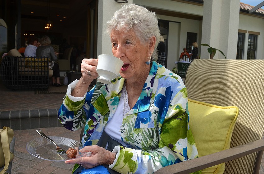 Phyllis Clifford sips on a cup of tea.