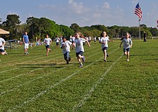 Kaidi Gullion, Maya Almand, Mazey Driscoll, Molly Aldrich and Hope Panagiotu race a 50 yard dash.
