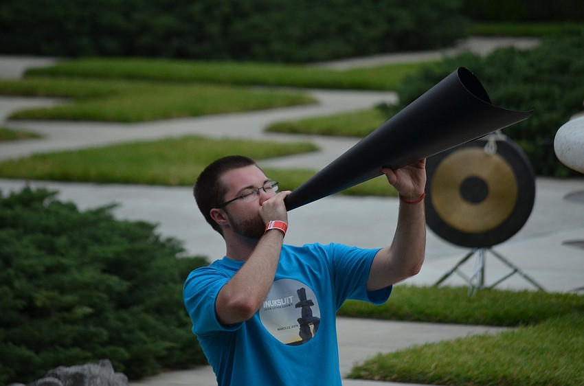 Sixty students from four colleges participate in Inuksuit