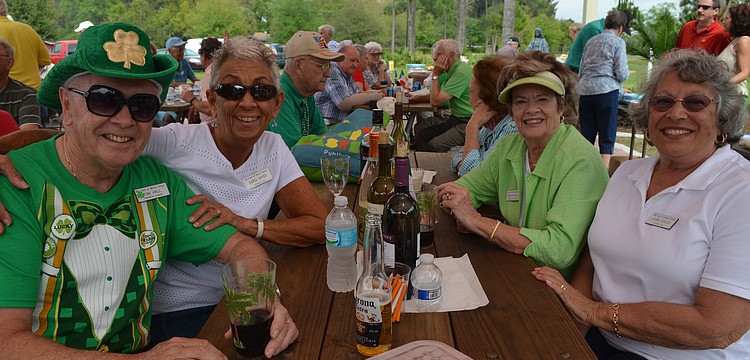 Tom Hall, Carol Hayes, Marilyn Hall and Joan Sacco dressed in green.