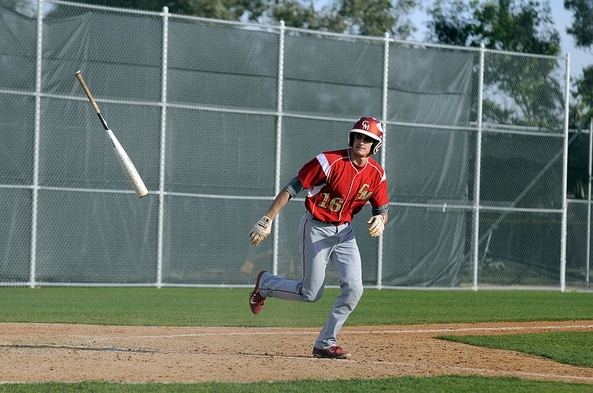 Cardinal Mooney catcher Matt Quinlan tosses his bat after drawing a walk to score a run against Miami Springs March 26.