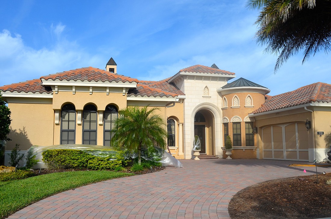 Amanda Sebastiano This Country Club Village at Lakewood Ranch home, which has five bedrooms, five baths, two half-baths, a pool and 4,941 square feet of living area, sold for $1.55 million.