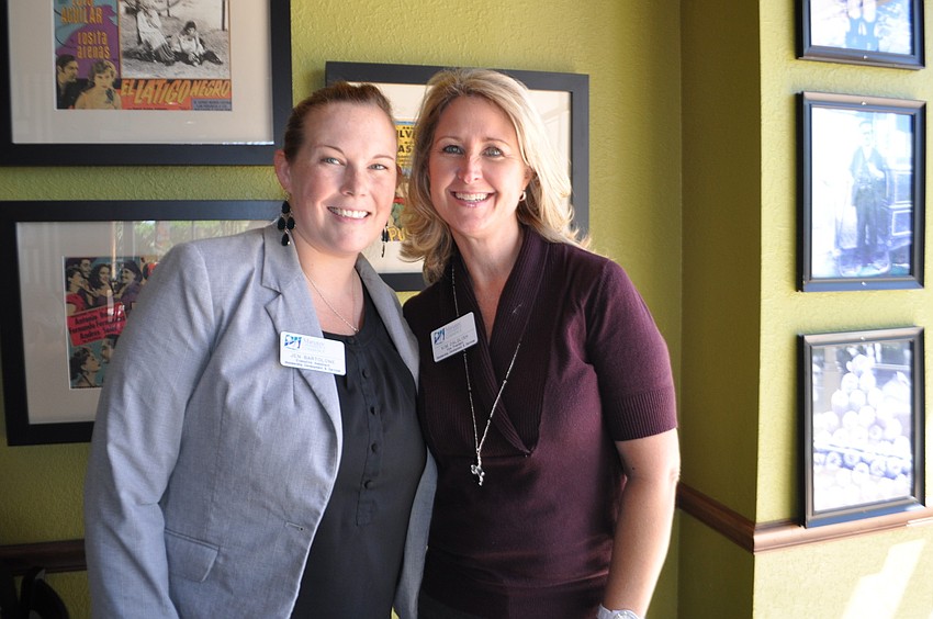 Jen Bartolone and Kim Dalglish, of the Manatee Chamber, register attendees.