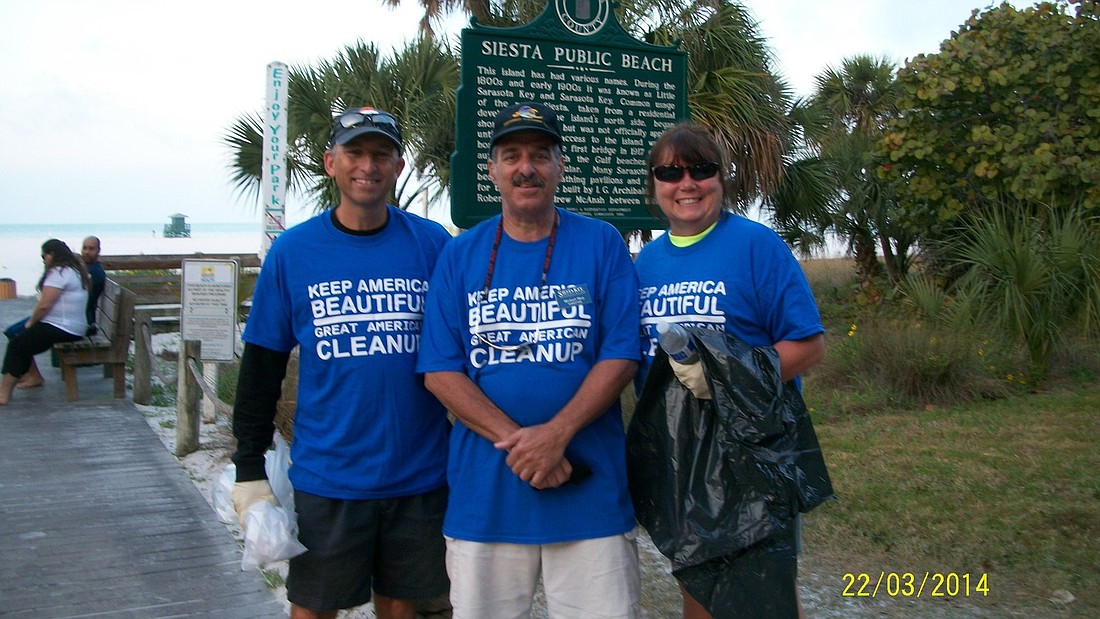 Michael Shay, president of SKA, center, with Tony and Marilyn Romanus of Siesta Isle (Courtesy photo)