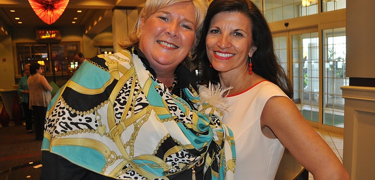 Maribeth Phillips, CEO of Meals on Wheels PLUS of Manatee, and Violeta Huesman from Keiser University