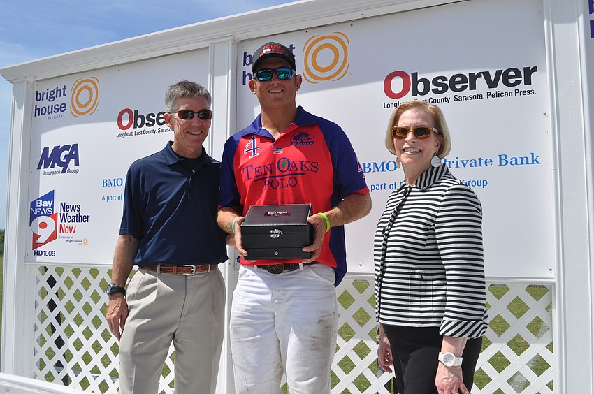 Match MVP Steve Krueger of Ten Oaks Polo with Matt and Lisa Walsh of the Observer Media Group