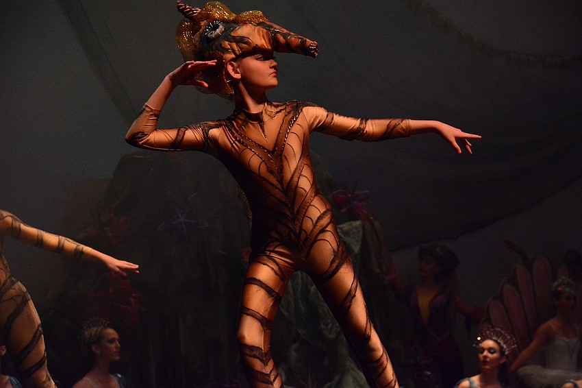 Alaina Kimsey portrays a seahorse.