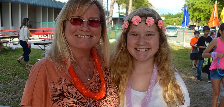 Barbara and Courtney Bradley enjoy playing dress up.