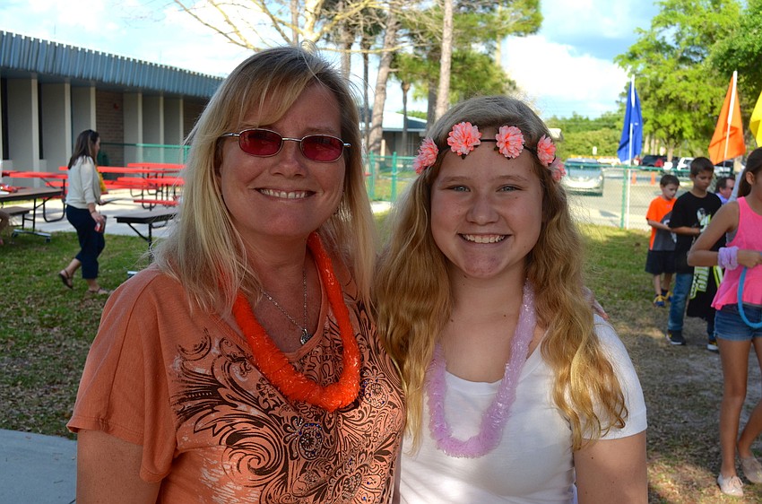 Barbara and Courtney Bradley enjoy playing dress up.