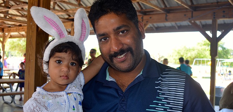 Aaniya and Akhlesh Mittal wait for the Easter Bunny.