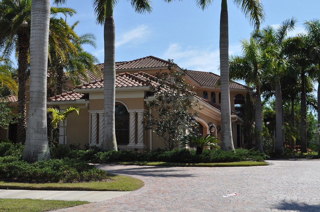 This Country Club Village at Lakewood Ranch home, which has four bedrooms, six baths, a pool and 5,837 square feet of living area, sold for $1.85 million. (Photo by Pam Eubanks)