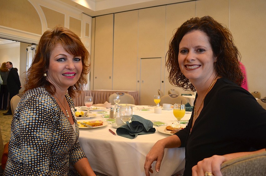 Kiddie Academy owner Marina Wolf-Schmidt and Academy Director Tina Pouso enjoy breakfast.