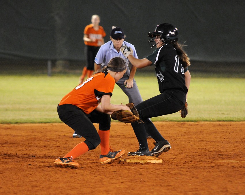 Sarasotaâ€™s Hannah Roberson tags out Lakewood Ranchâ€™s Kyra Bickerstaff on a fielderâ€™s choice.