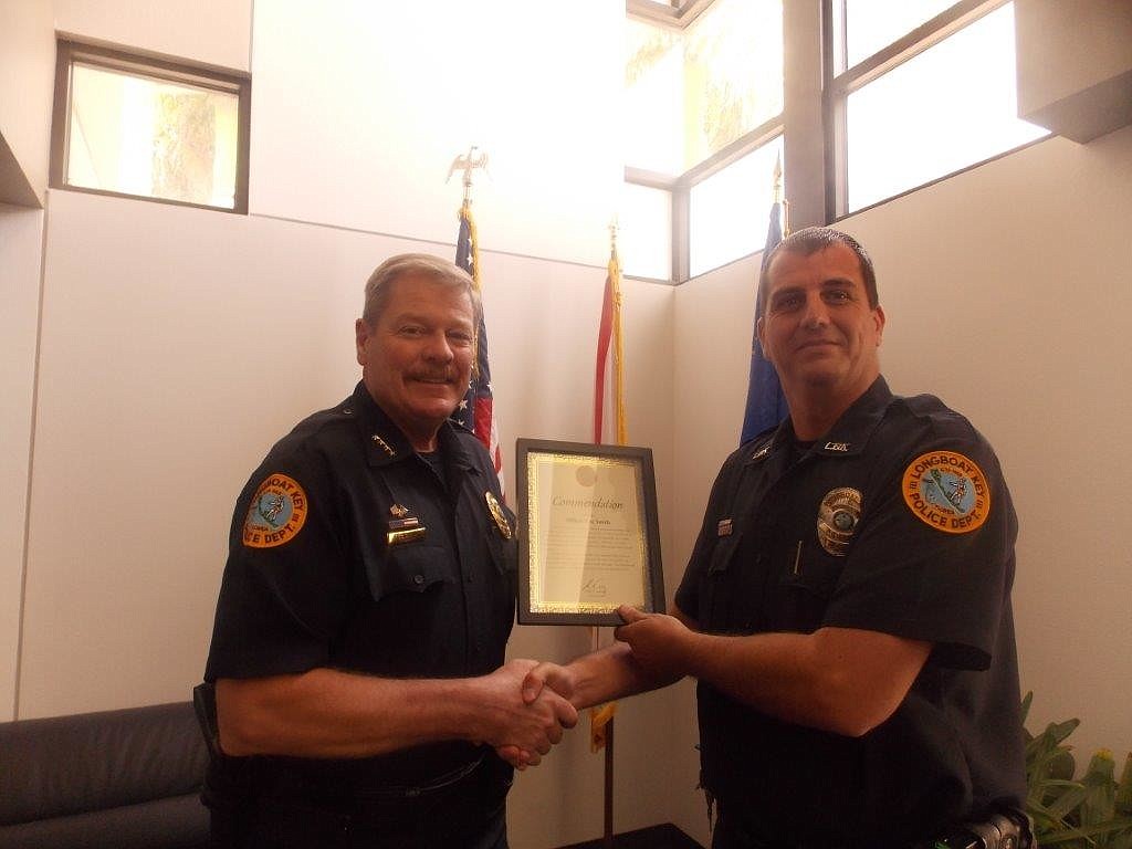 Longboat Key Police Chief Pete Cumming with Officer Lee Smith (Courtesy photo)