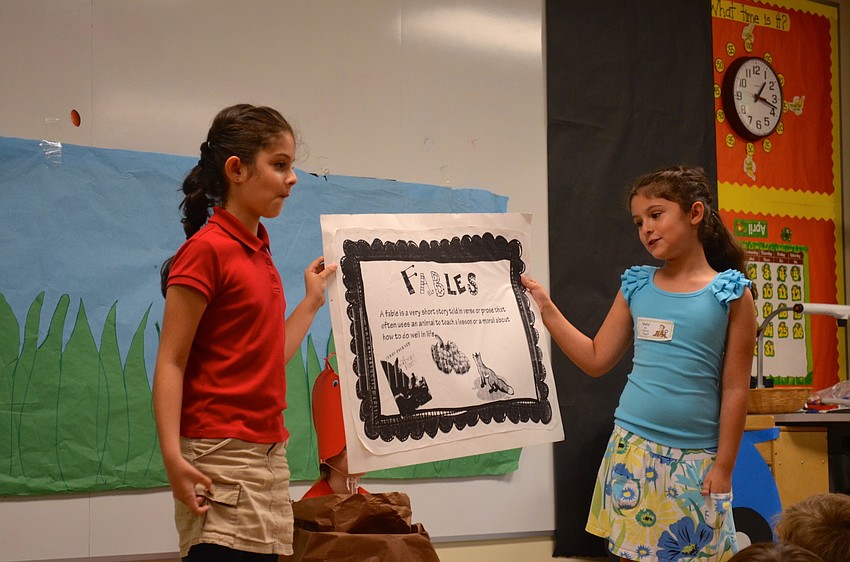 Twins Kayla and Kiana Foroughi introduce the fable portion of the program.