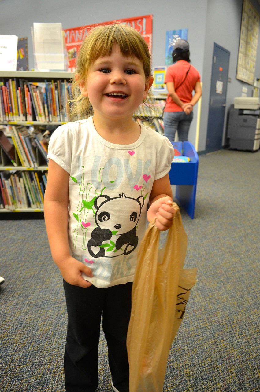 Molly Hamlyn can't wait to eat her candy.