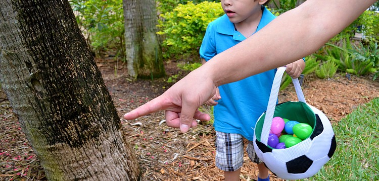 Antonio Edmoundson found an egg with some help from his mother.