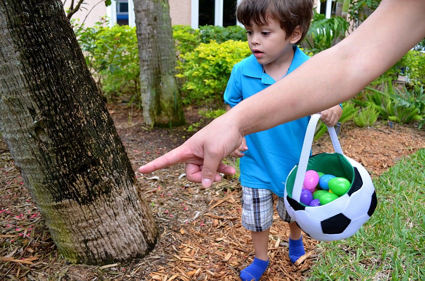 Antonio Edmoundson found an egg with some help from his mother.