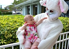 Madeline Carnahan meets the Easter Bunny at Bird Key Yacht Club.