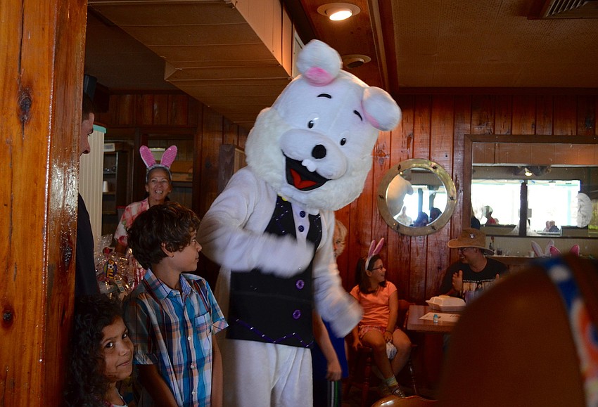 The Easter Bunny dances around Mooreâ€™s Restaurant.