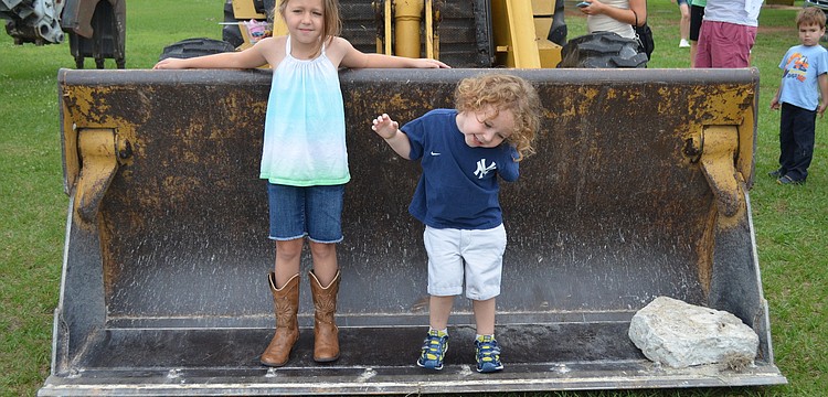 Olivia and Logan Armstrong goof around.