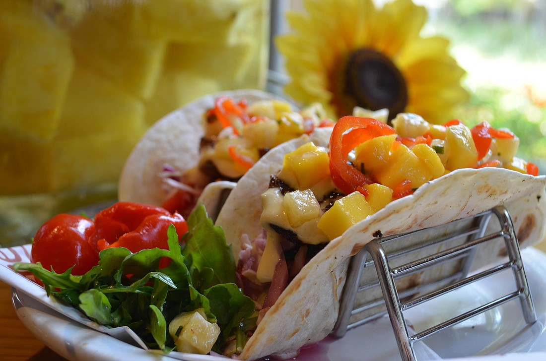 Fish tacos at Eat Here Sarasota feature locally caught fish, Brazilian sweet red pepper and pineapple.