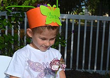 The butterfly on Chiana Webberâ€™s carnation munches on the sugar-covered carnation before flying away.